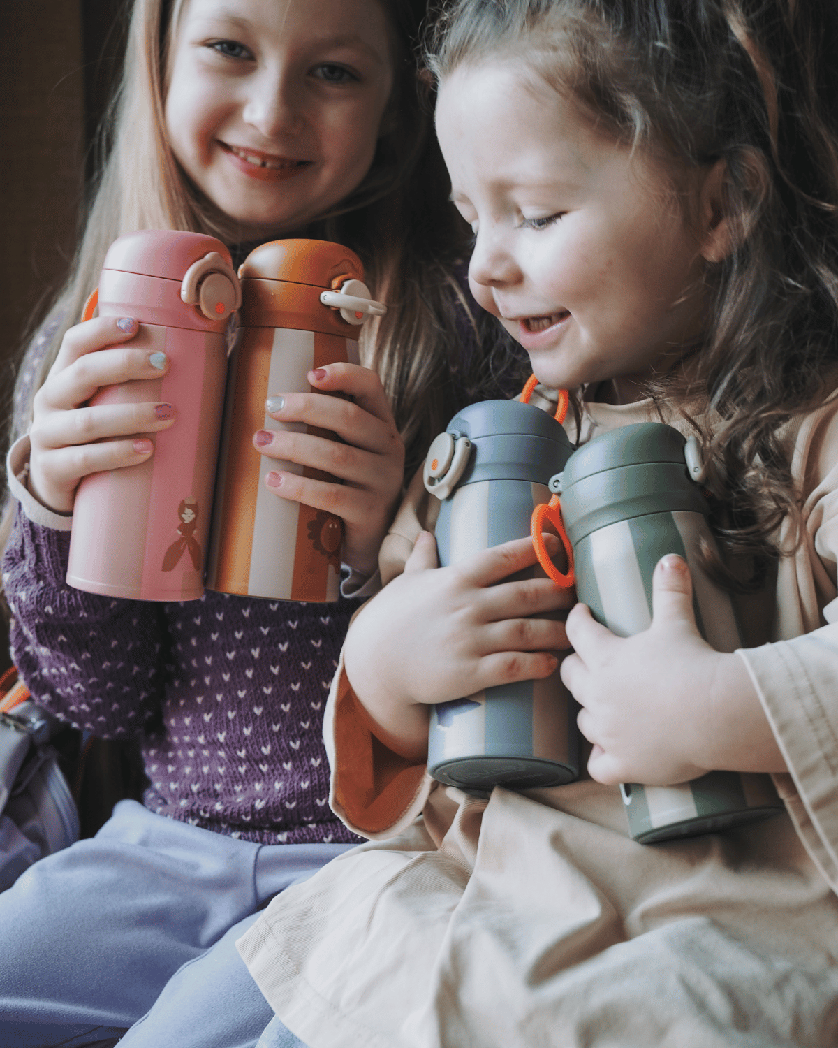 Striped 350 ml stainless steel water bottle for kids with a lion on – insulated and easy to carry