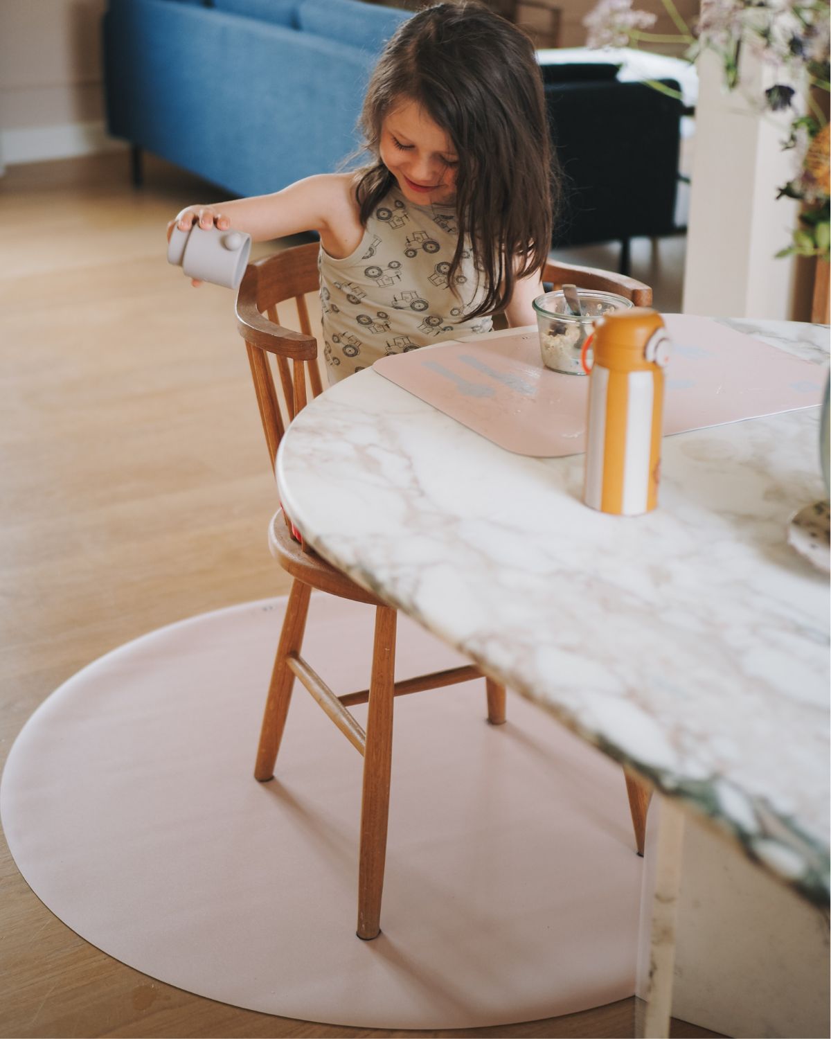 Round floor mat in nude for high chair – protects floor from spills and mess during mealtime