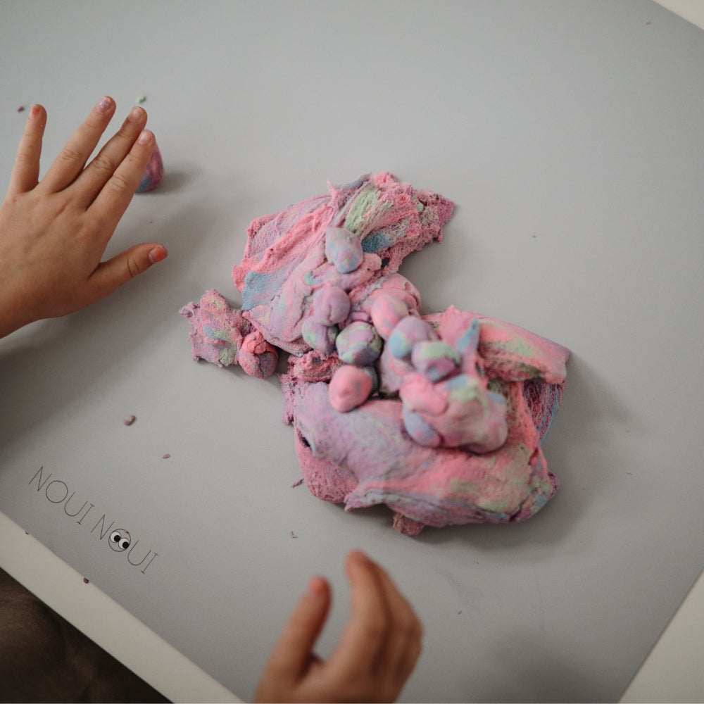 Playdough on our grey powder color placemat. Perfect to protect the table surface.