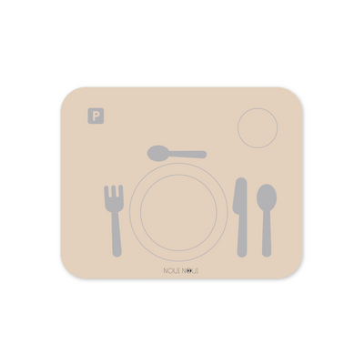 A nude learning placemat with illustrations of a plate, fork, knife, and spoon on it. Perfect helper when the child wants to help setting the table.