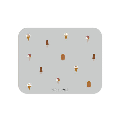 A rectangular grey placemat with a pattern of various ice cream designs across the surface.