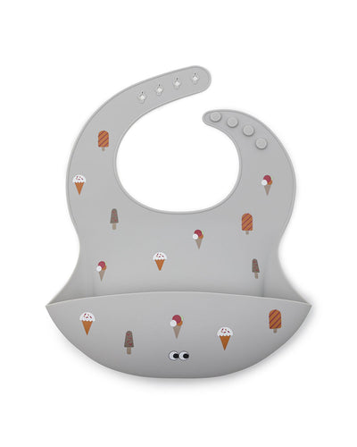 Silicone bib with cute ice creams on a grey powder background. Extra large cup and a adjustable strap in the neck.