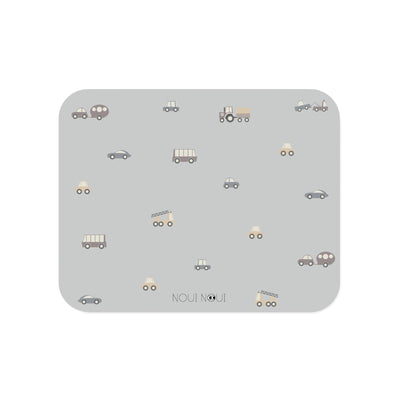 Placemat in grey powder color with a pattern of cars and other vehicles in grey tones.