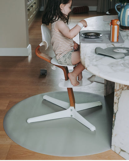 Stylish olive haze round floor mat under high chair – protects floors during baby mealtime