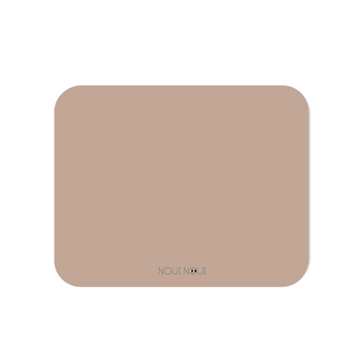 Placemat in old rose color on a white backgrund.