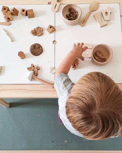 A rectangular dusty olive high chair floor mat laid out flat. Protects all kind of flooring from spills and fluids. 