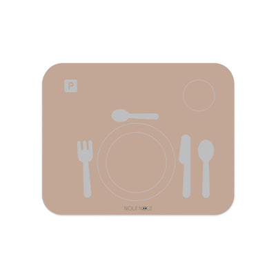 A rose-colored learning placemat with illustrations of a plate, fork, knife, and spoon, and sections marked for 'cutlery,' 'plates,' and 'drinks.'.