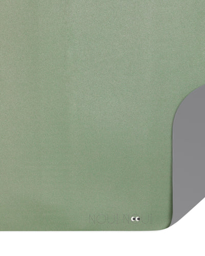 A rectangular, dusty olive colored XL placemat.